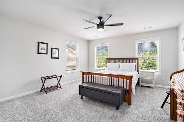5696 Walnut Mill Ln, Powder Springs, GA 30127 - carpeted bedroom featuring baseboards and a ceiling fan