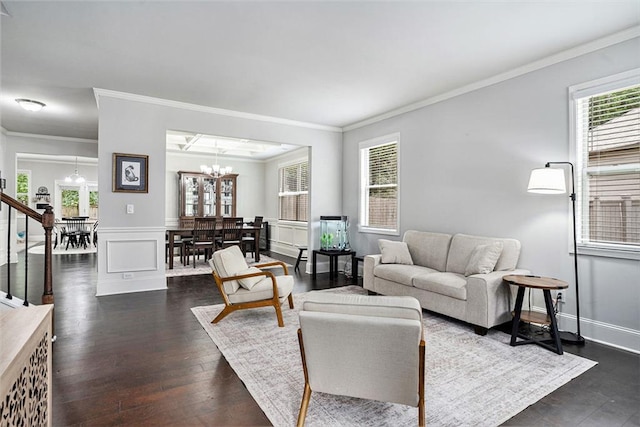 5696 Walnut Mill Ln, Powder Springs, GA 30127 - living area featuring a chandelier, ornamental molding, and dark wood-style flooring