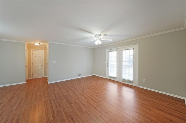 unfurnished room featuring wood-type flooring, ornamental molding, and ceiling fan