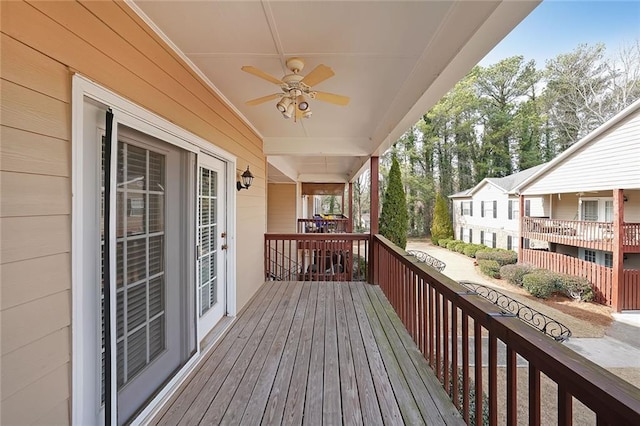 wooden terrace with ceiling fan