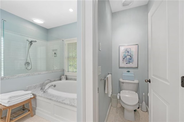 bathroom with a shower stall, toilet, and a bath