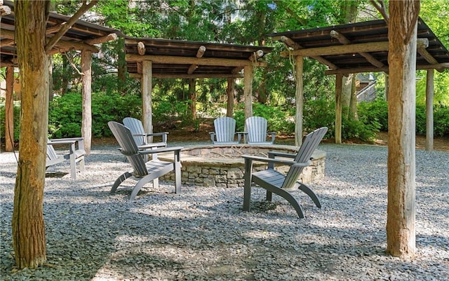 exterior space featuring an outdoor fire pit