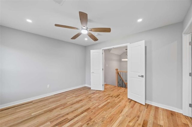 unfurnished bedroom featuring baseboards, a ceiling fan, light wood-style flooring, and recessed lighting