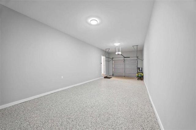 garage with baseboards