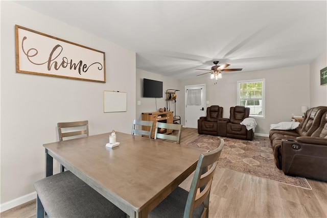 153 Garrison Dr, Cleveland, GA 30528 - dining space featuring light wood-style flooring, ceiling fan, and baseboards