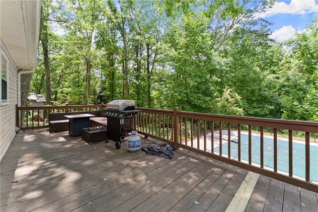 153 Garrison Dr, Cleveland, GA 30528 - wooden deck featuring area for grilling