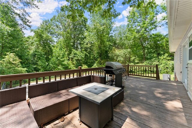153 Garrison Dr, Cleveland, GA 30528 - wooden deck featuring an outdoor living space with a fire pit and a grill
