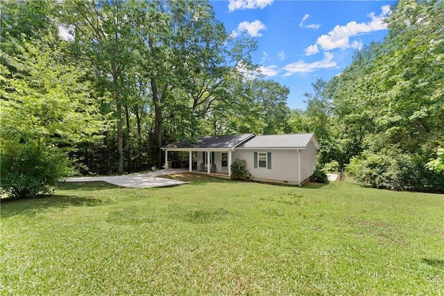 153 Garrison Dr, Cleveland, GA 30528 - rear view of property with a lawn, crawl space, metal roof, a carport, and a patio