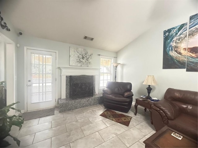 3484 Lynley Mill Ln, Dacula, GA 30019 - tiled living area with a fireplace and vaulted ceiling