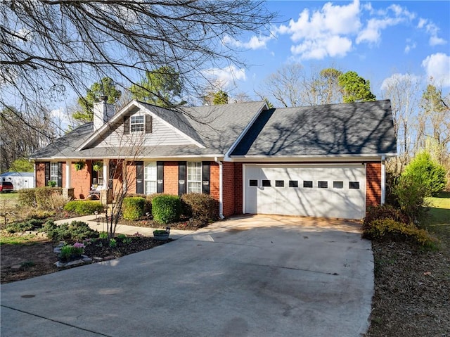 view of front of property with concrete driveway, an attached garage, brick siding, and a chimney