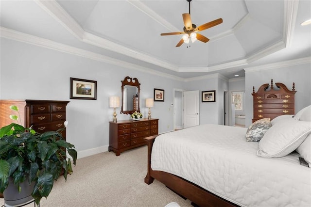 bedroom featuring ceiling fan, light carpet, baseboards, ornamental molding, and a tray ceiling