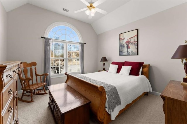 bedroom featuring lofted ceiling, light carpet, ceiling fan, and visible vents