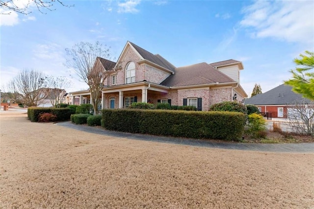 view of front facade with brick siding