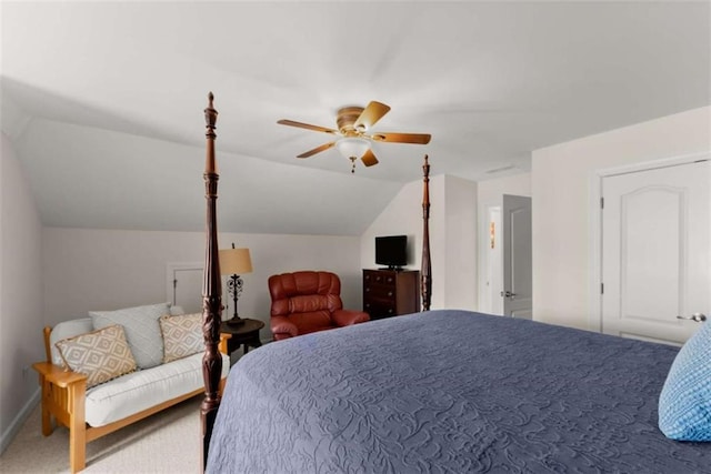 bedroom featuring vaulted ceiling, carpet flooring, a ceiling fan, and baseboards