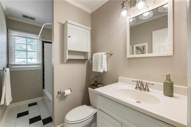 bathroom with ornamental molding, baseboards, toilet, vanity, and tile patterned flooring