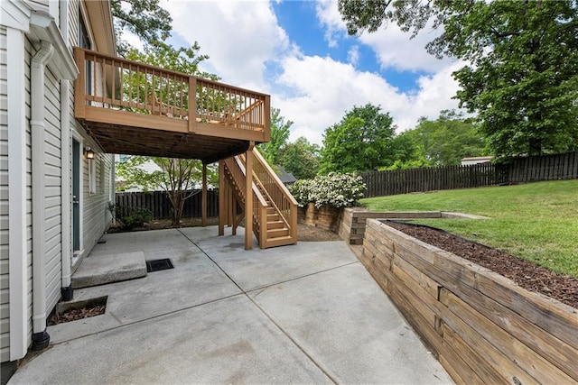 view of patio / terrace featuring a deck and stairs