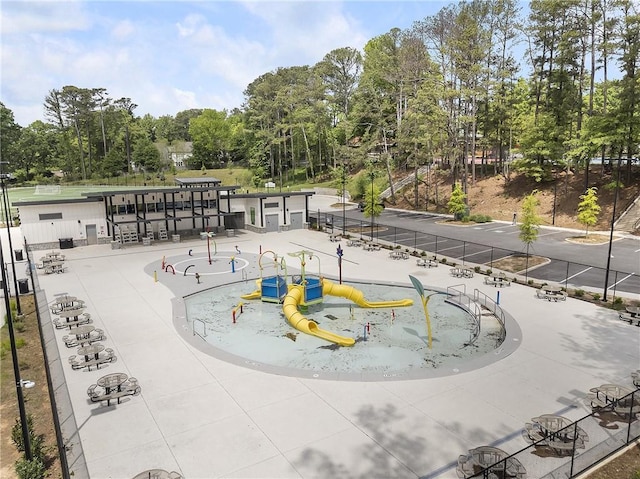 view of property's community featuring view of scattered trees