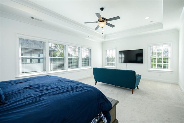 6666 Sterling Dr, Sandy Springs, GA 30328 - carpeted bedroom with a tray ceiling, multiple windows, crown molding, baseboards, and ceiling fan