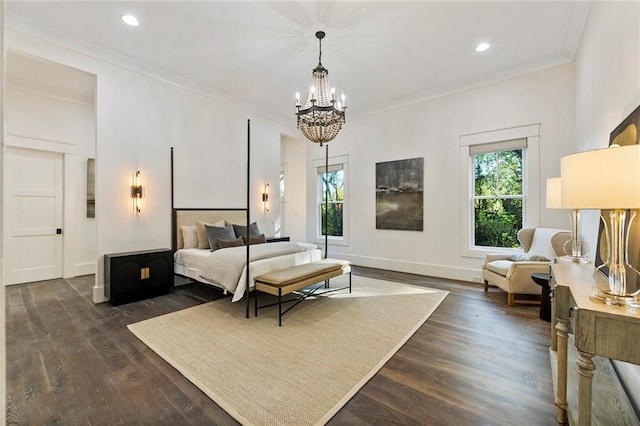 bedroom with ornamental molding, dark wood-type flooring, and an inviting chandelier