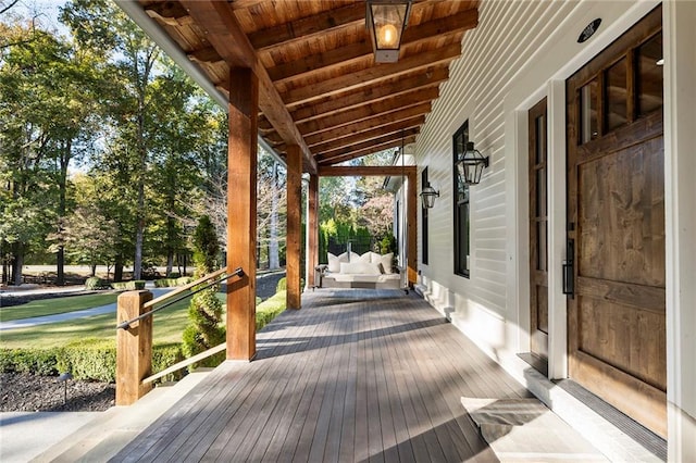 wooden deck featuring a porch