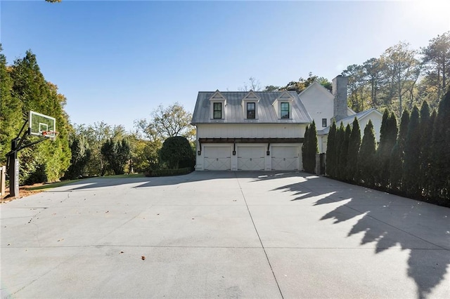 exterior space with a garage