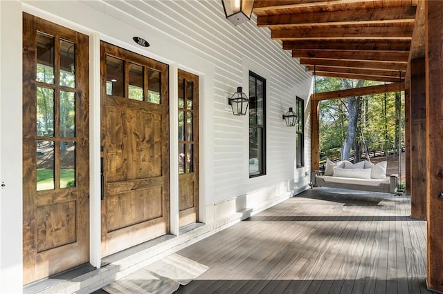 entrance to property with a porch