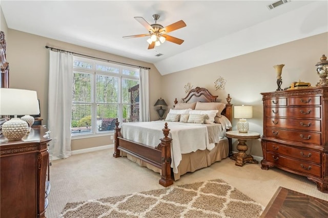 bedroom featuring baseboards, a ceiling fan, light colored carpet, and visible vents