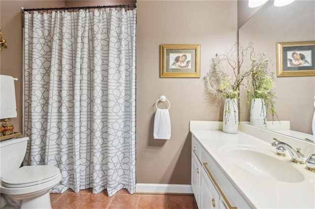 bathroom with vanity, toilet, baseboards, a shower with shower curtain, and tile patterned floors