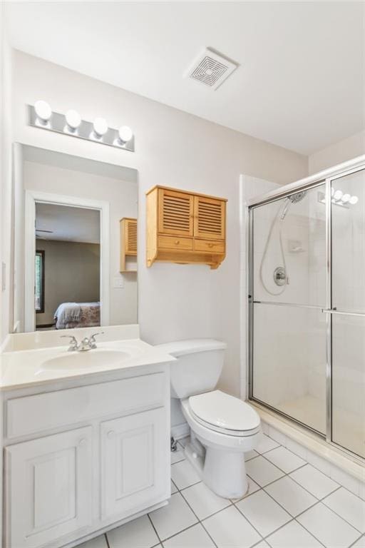 full bathroom with visible vents, vanity, toilet, ensuite bathroom, and a stall shower