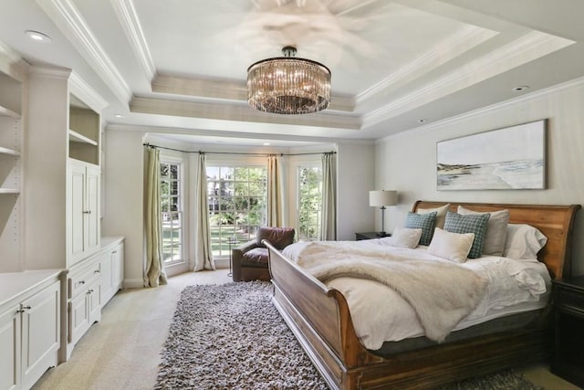 bedroom with a raised ceiling, light carpet, ornamental molding, and an inviting chandelier