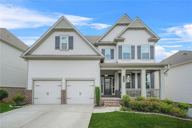 4110 Morgan Elizabeth Way, Cumming, GA 30041 - craftsman-style home with covered porch, driveway, a garage, and brick siding
