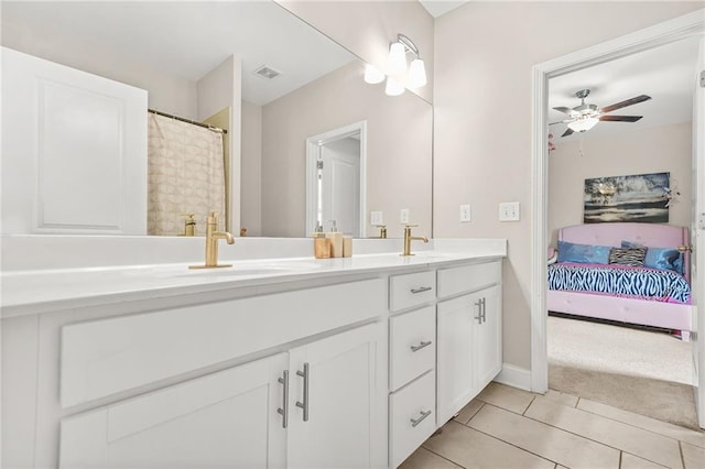 4110 Morgan Elizabeth Way, Cumming, GA 30041 - ensuite bathroom with double vanity, tile patterned flooring, ceiling fan, and baseboards