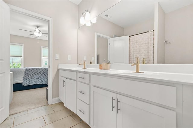 4110 Morgan Elizabeth Way, Cumming, GA 30041 - ensuite bathroom featuring double vanity, ceiling fan, and tile patterned floors
