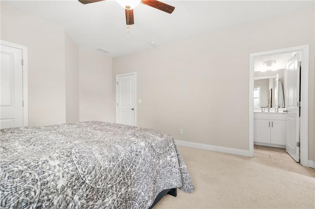 4110 Morgan Elizabeth Way, Cumming, GA 30041 - bedroom with light colored carpet, baseboards, ensuite bathroom, and ceiling fan