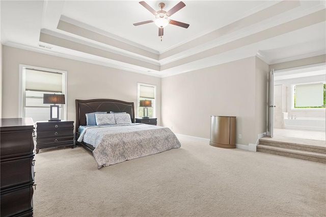 4110 Morgan Elizabeth Way, Cumming, GA 30041 - carpeted bedroom featuring crown molding, a tray ceiling, baseboards, connected bathroom, and ceiling fan