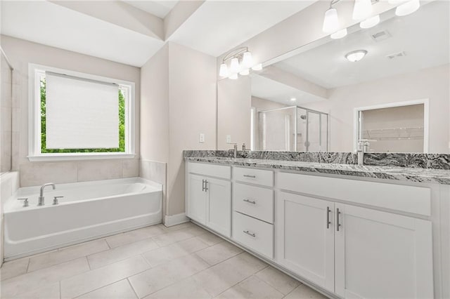 4110 Morgan Elizabeth Way, Cumming, GA 30041 - bathroom with double vanity, a stall shower, a bath, baseboards, and tile patterned flooring