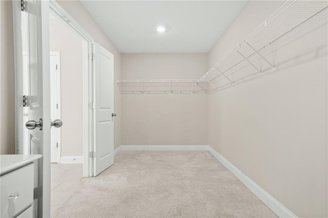 4110 Morgan Elizabeth Way, Cumming, GA 30041 - walk in closet featuring light carpet