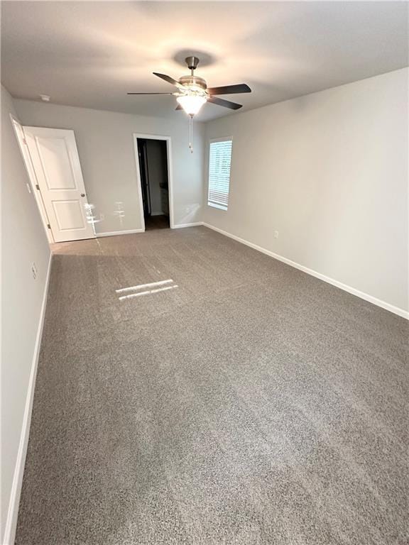 836 Courthouse Park Dr, Temple, GA 30179 - spare room with carpet floors, baseboards, and ceiling fan