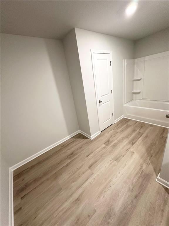 836 Courthouse Park Dr, Temple, GA 30179 - spare room featuring light wood-style flooring and baseboards