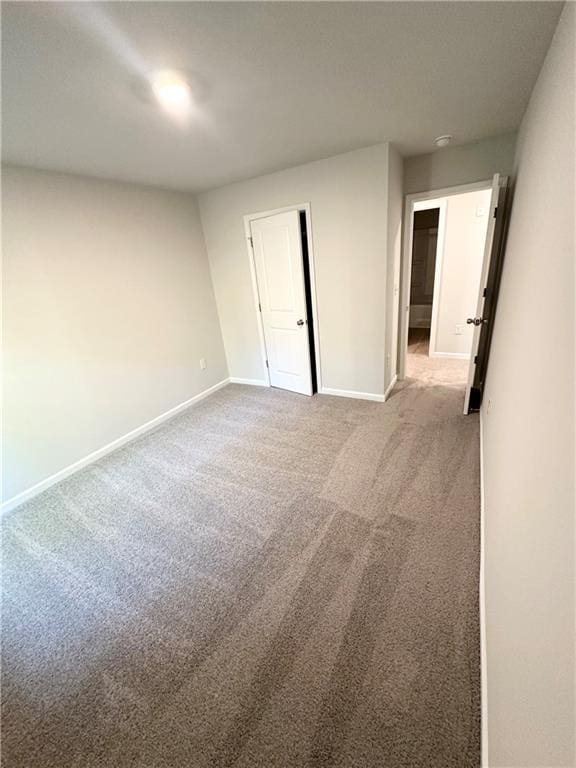 836 Courthouse Park Dr, Temple, GA 30179 - carpeted spare room featuring baseboards