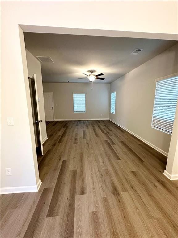836 Courthouse Park Dr, Temple, GA 30179 - unfurnished room with wood finished floors, baseboards, and ceiling fan