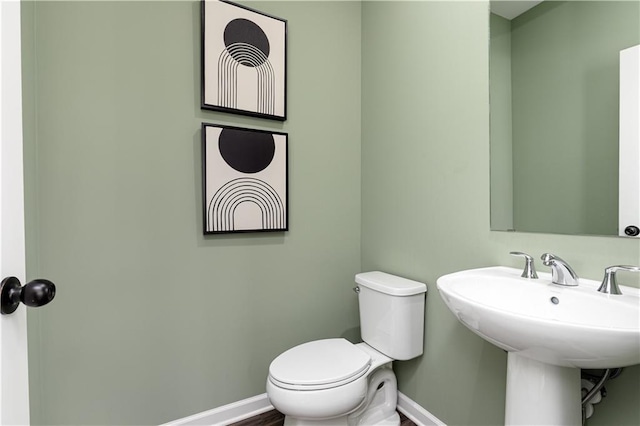 2682 Brookview Ln NW, Atlanta, GA 30318 - bathroom with baseboards and toilet