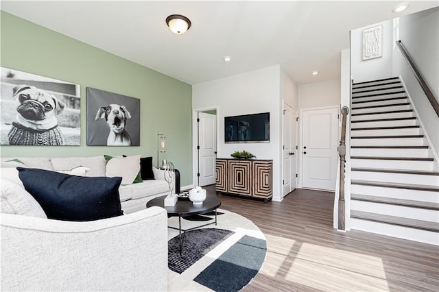 2682 Brookview Ln NW, Atlanta, GA 30318 - living room with wood finished floors, stairs, and recessed lighting