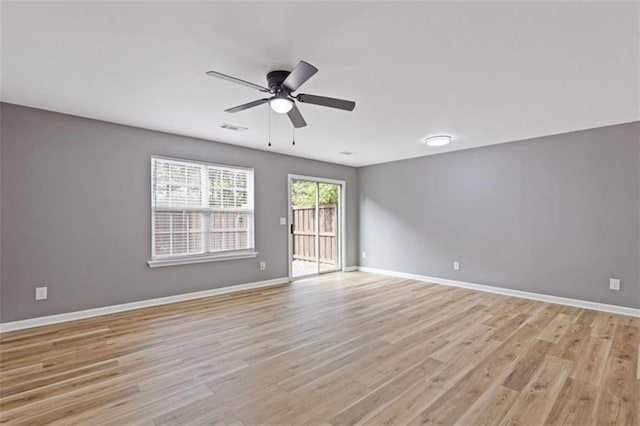 2183 Miranda Dr, Morrow, GA 30260 - spare room featuring light wood-type flooring and a ceiling fan