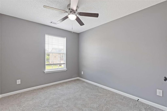 2183 Miranda Dr, Morrow, GA 30260 - carpeted spare room with ceiling fan and a textured ceiling