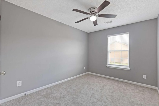 2183 Miranda Dr, Morrow, GA 30260 - carpeted spare room with a ceiling fan and a textured ceiling