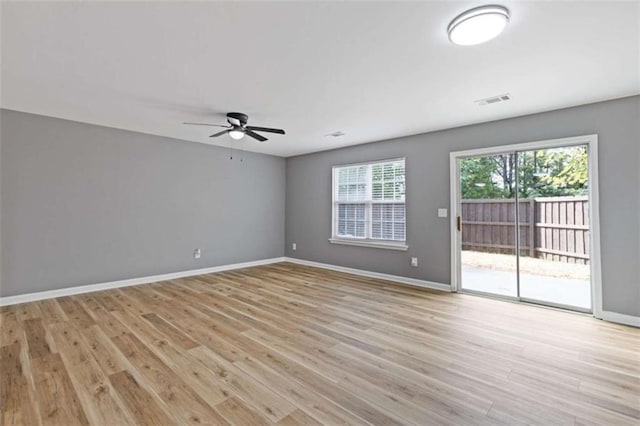 2183 Miranda Dr, Morrow, GA 30260 - spare room featuring a ceiling fan and light wood-style floors