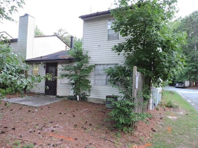 rear view of property with a patio