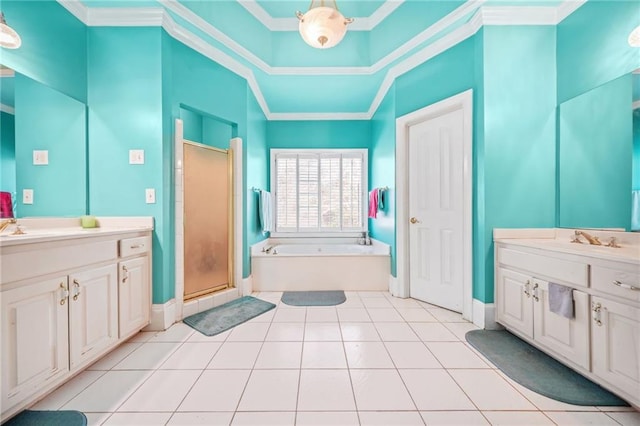 bathroom featuring tile patterned flooring, vanity, separate shower and tub, and ornamental molding