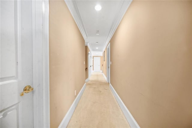 corridor featuring ornamental molding